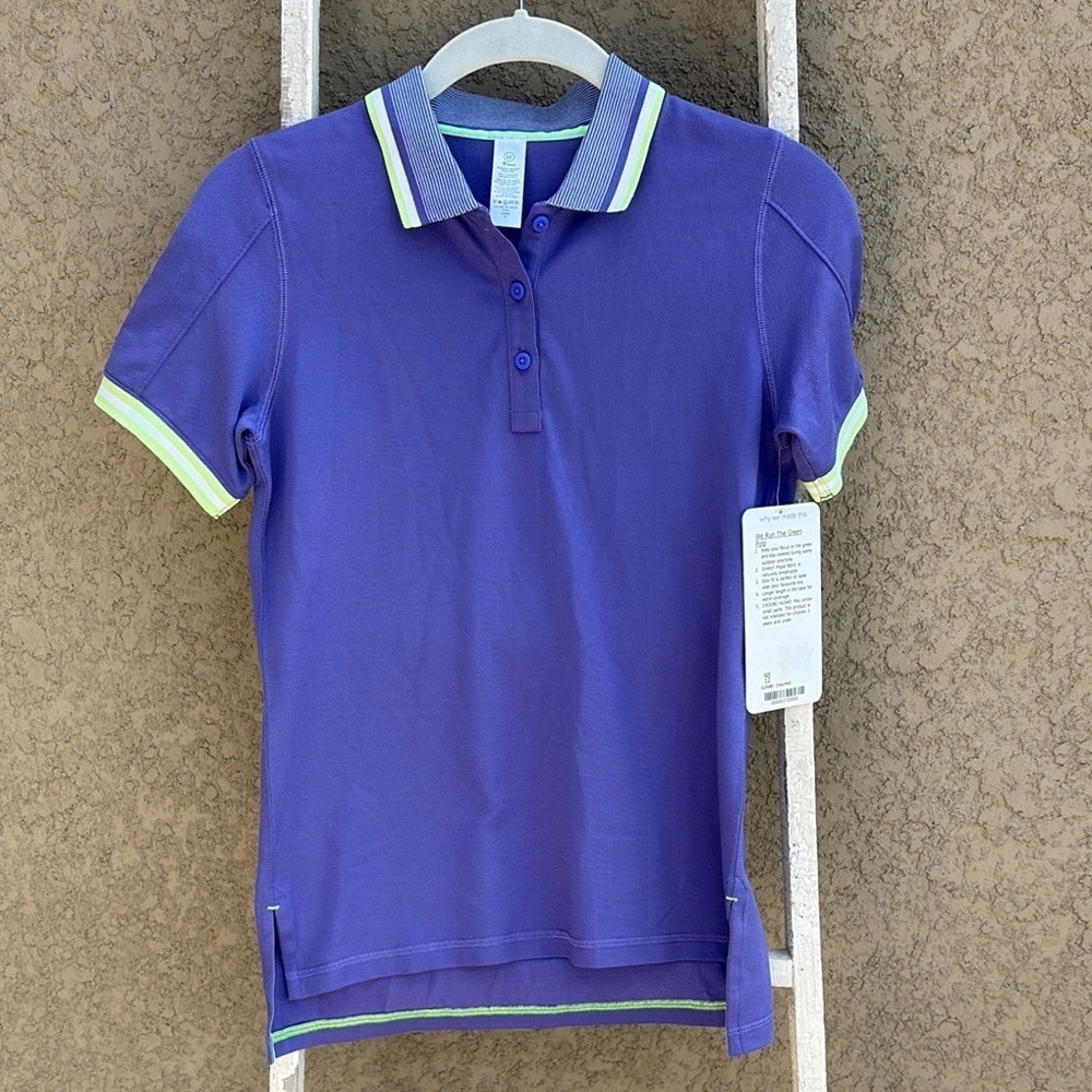 Lululemon Ivivva purple We Run The Green polo shirt